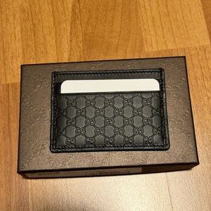 Gucci Embossed GG Leather Card Case